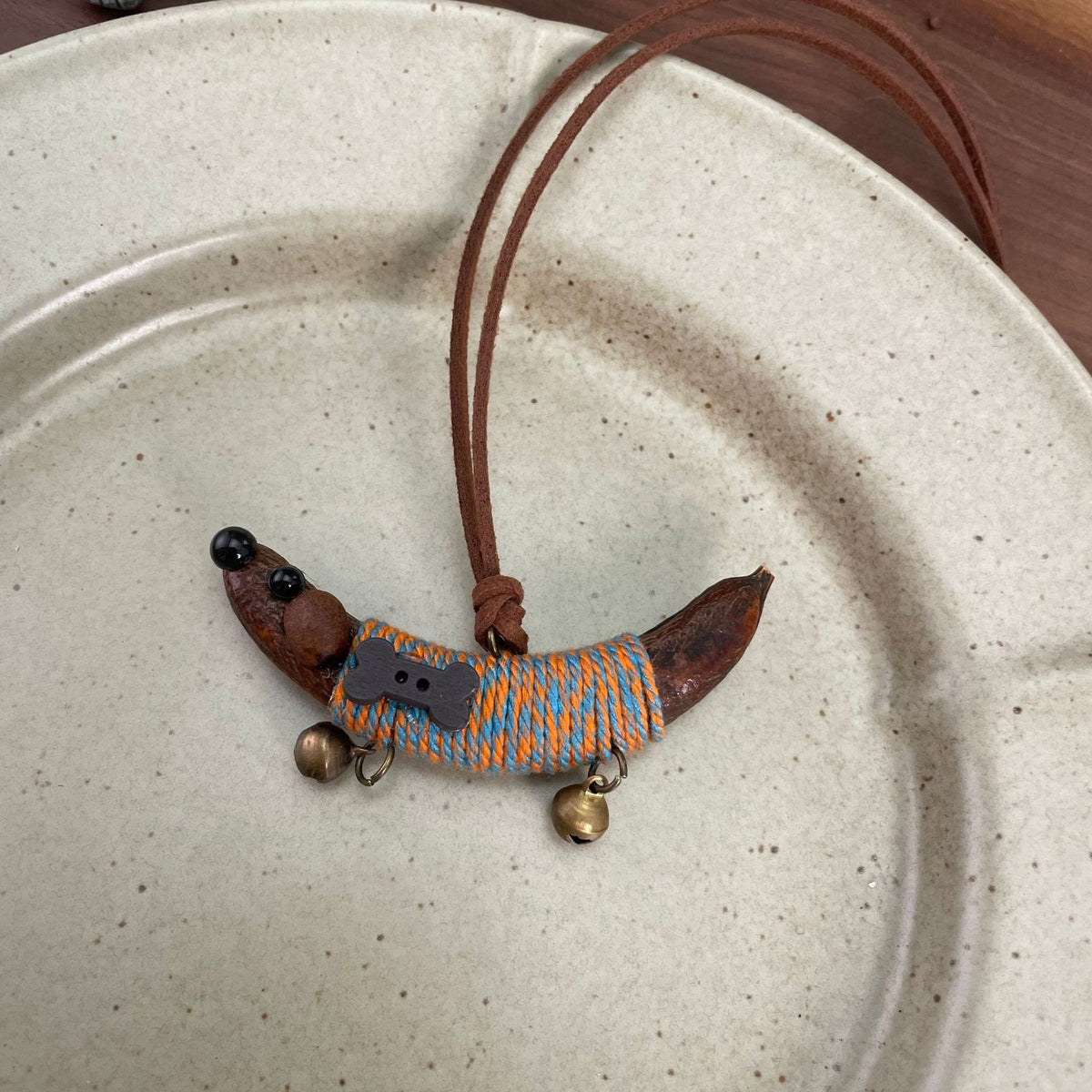 Wrapped Pea-Pod Dachshund Charm with Bell Feet