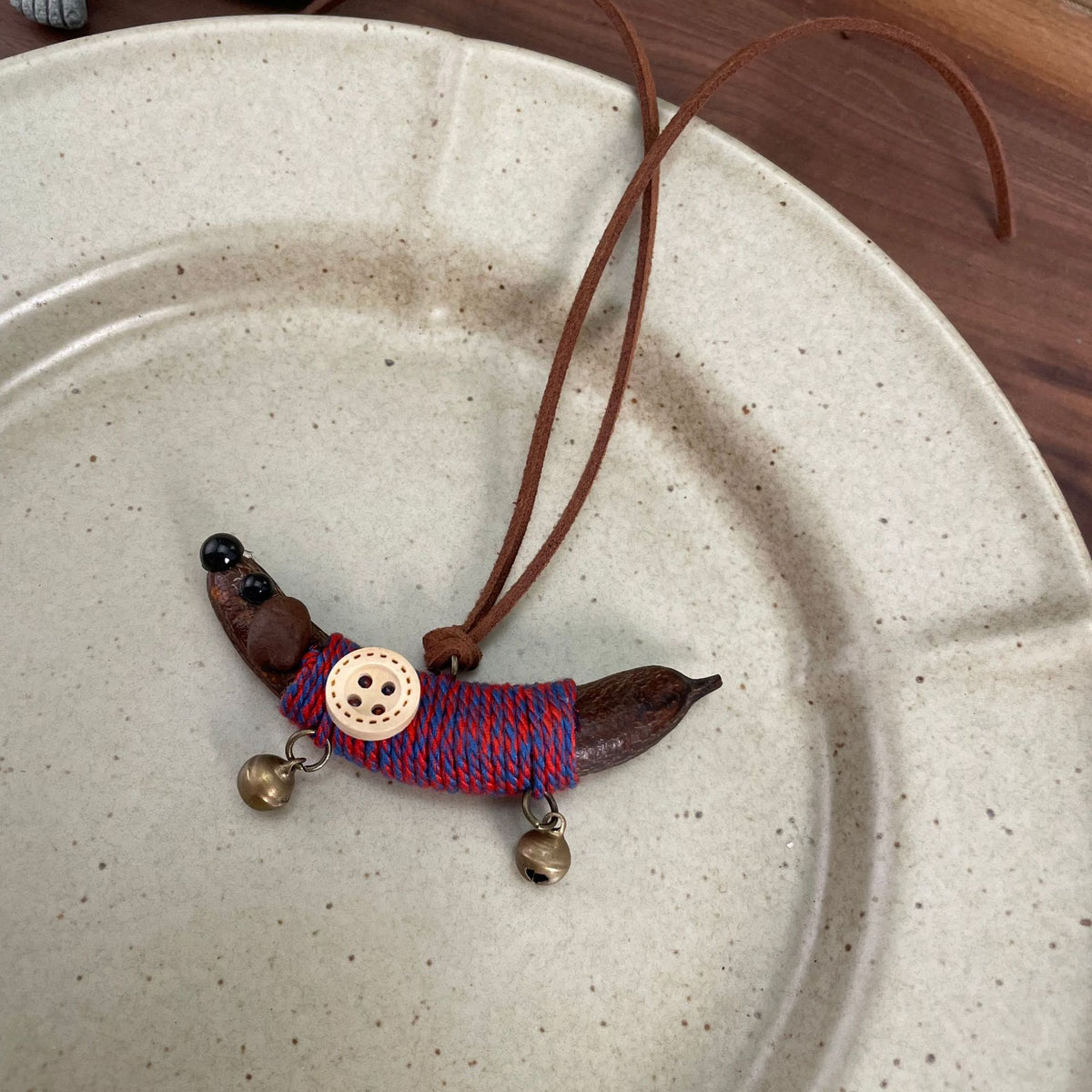 Wrapped Pea-Pod Dachshund Charm with Bell Feet