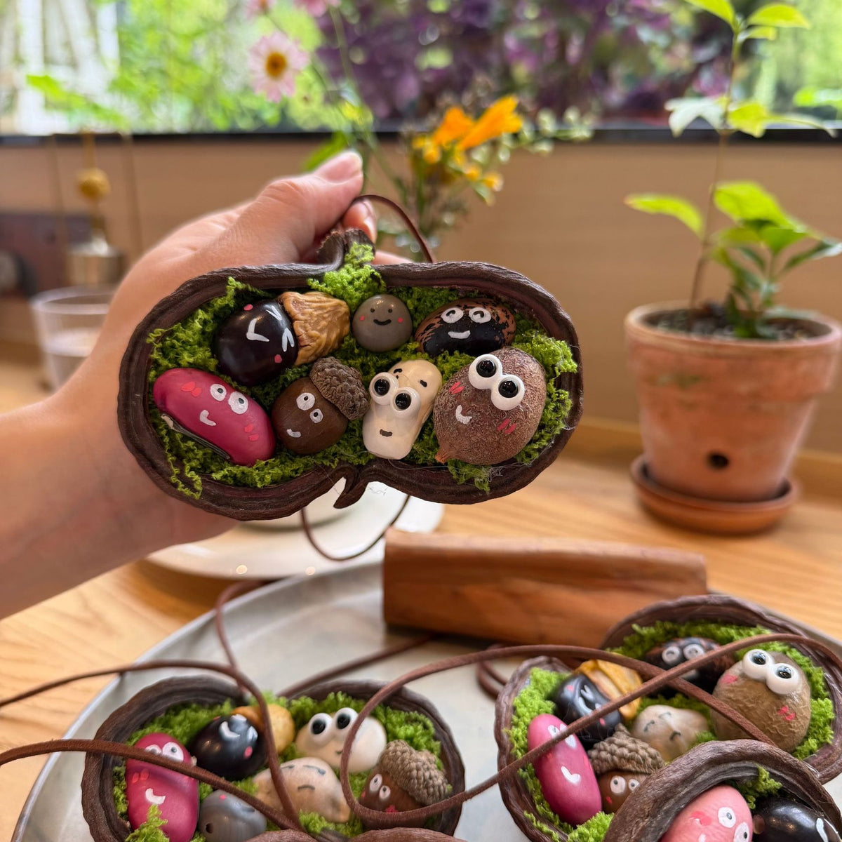 Open Seed-Pod Charm with Painted Seed Faces