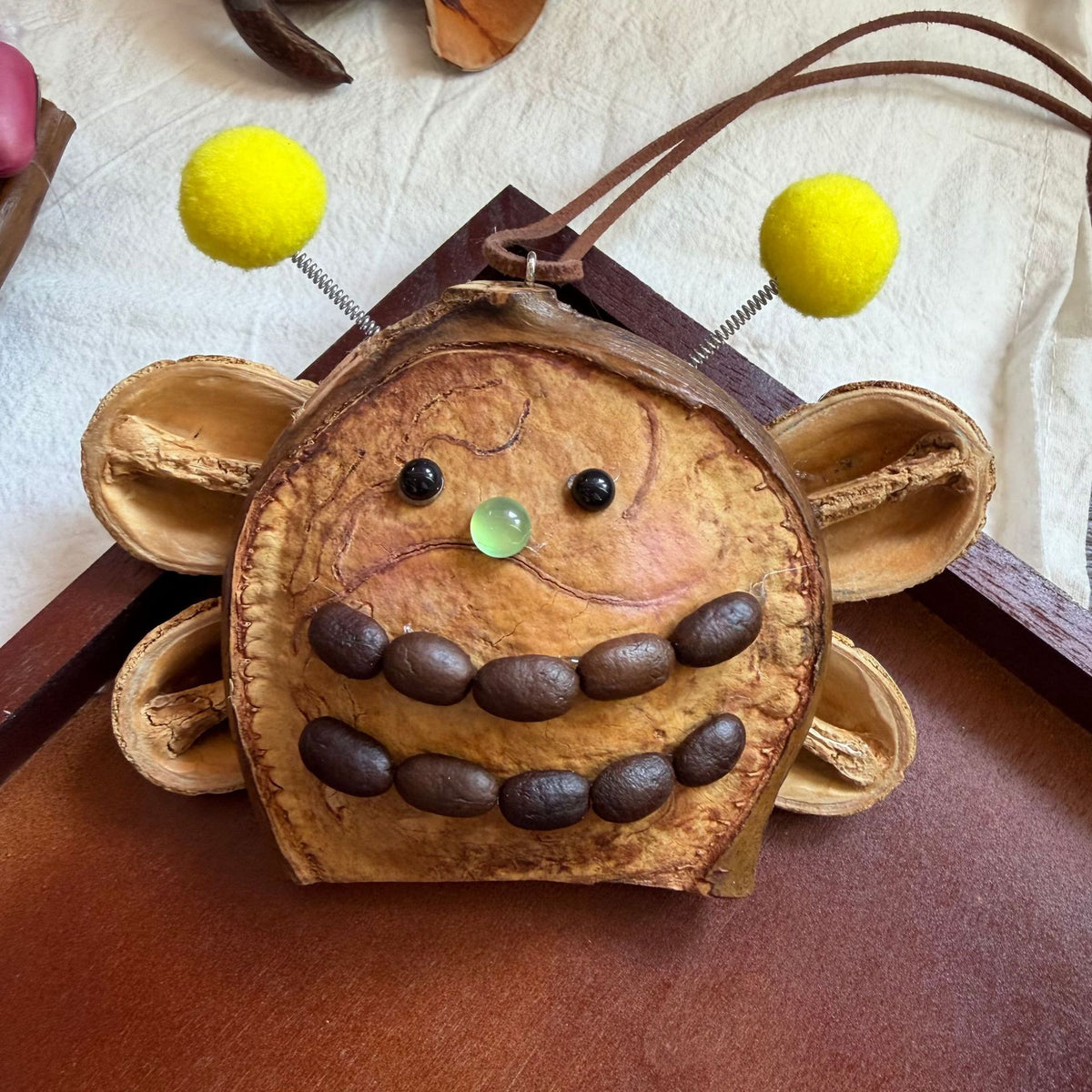 Seed-Ear Pod Animal Charm