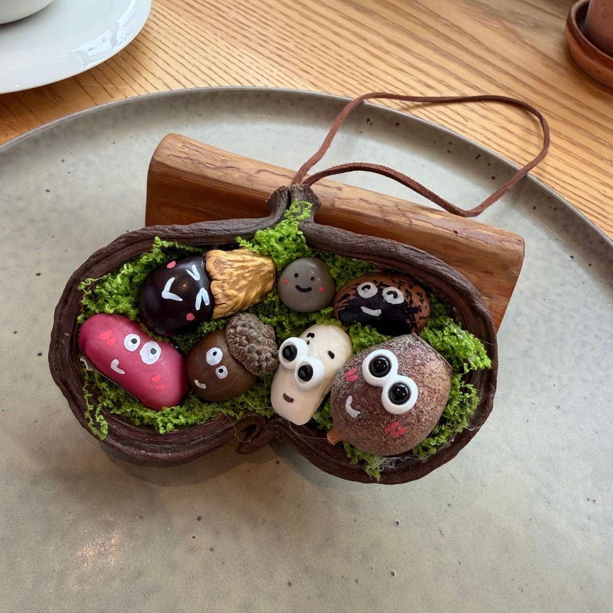 Open Seed-Pod Charm with Painted Seed Faces